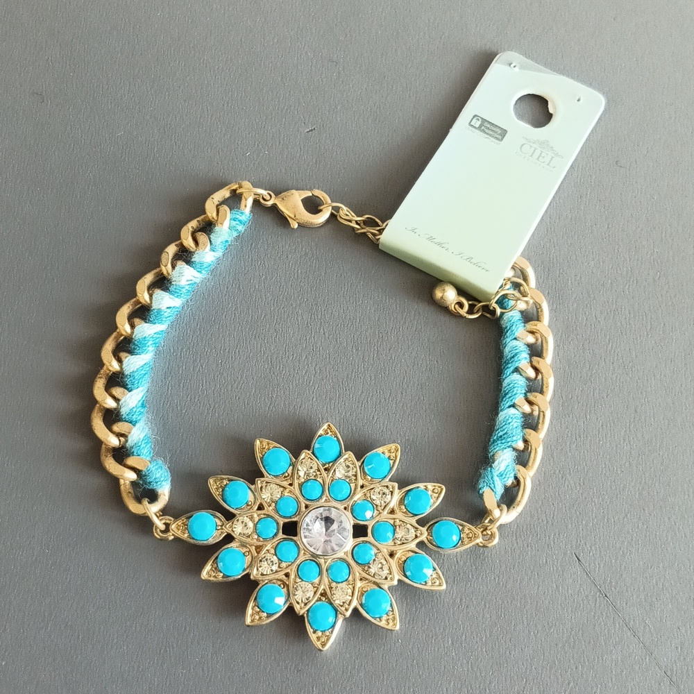 2/$15 + $4.99 Shipping Turquoise & Gold Tone Bracelet with Floral Design